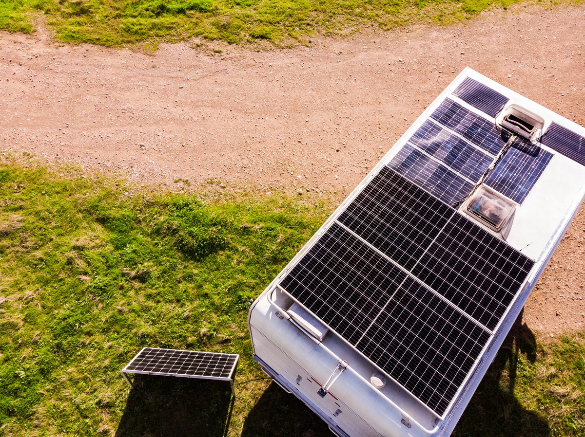 RV rooftop solar panels at a campsite